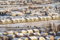 Residential neighborhood with apartments and homes on a snowy winter landscape Royalty Free Stock Photo