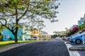 Residential neighborhood of colorful town houses/vacation homes. Upscale gated community residences in Caribbean island.
