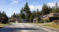 Residential neighborhood Street in Modern City Suburbs. Royalty Free Stock Photo