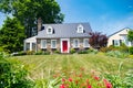 Residential one-story house for one family. Traditional American style home with beautiful landscaping