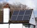 Residential solar panels on rooftop used to generate electricity