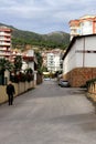 Residential street with a going man in the Alanya city Royalty Free Stock Photo