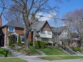 Residential street with large detached houses