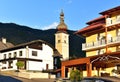 Residential street with the St. John Church during sunset. Obermillstatt, Austria Royalty Free Stock Photo