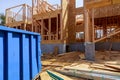 Residential view of new houses being built and construction garbage Royalty Free Stock Photo