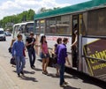 Residents of the city take public transport at the bus stop in Voronezh, Russia