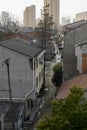 Residents clear snow from the sunless paths between the houses in Xiantao, China