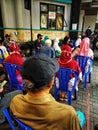 Residents queue for vaccines at the Pisangan Timur Health Center, East Jakarta. Royalty Free Stock Photo