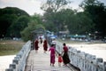 Residents and visitors traveling on the U-bein Bridge,Myanmar.