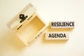Resilience agenda symbol. Concept word Resilience agenda typed on wooden blocks. Beautiful white table white background. Empty Royalty Free Stock Photo