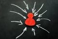 Resilience and assertiveness concept. Red figurine and arrows. Royalty Free Stock Photo