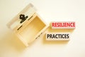 Resilience practices symbol. Concept word Resilience practices typed wooden blocks. Beautiful white table white background. Empty Royalty Free Stock Photo