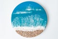 Resin art pound painting with sea waves and beach. Ocean made of epoxy art