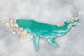 Resin art whale and stones on gray. Flat lay Royalty Free Stock Photo