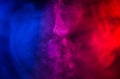 Resistance of blue and red smoke in slow motion Royalty Free Stock Photo