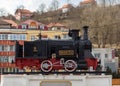 Resita, Romania, March 14, 2021: Close-up photo of the first steam locomotive manufactured in the industrial city of Resita in the