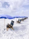 White sand chairs umbrellas beach Hilton head South Carolina Royalty Free Stock Photo