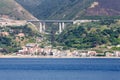 Resort Homes Under Highway Bridge on Italian Coast Royalty Free Stock Photo