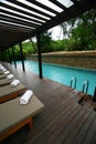 Resort hotel swimming pool, tropical landscaping