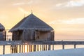 Resort in Maldives. Water villas along wooden jetty Royalty Free Stock Photo