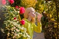 Resort with mineral water sources. Enjoy every sip of crystal clear water in blooming garden. Girl drink water. Woman Royalty Free Stock Photo