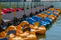 Resort pier with boats and catamarans on the lake Royalty Free Stock Photo