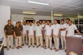 Resort staff gathered for group photo in the office Royalty Free Stock Photo