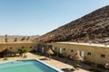 Resort with swimming pool in sahara desert