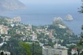 Resort town Gurzuf, buildings beach sea mountain plunged in a fog. Southern coast of the Black Sea, Crimea.