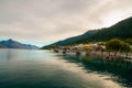 Qeenstown Wharf New Zealand, dock pier on Lake Wakatipu, resort town and Walter Peak