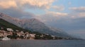 The resort village Brela, Croatia on the Adriatic Sea, view from the sea on a summer evening Royalty Free Stock Photo