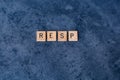 `RESP` Registered Education Savings Plan spelled out in wooden letter tiles Royalty Free Stock Photo