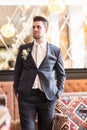 Respectable young man in vintage interior. Royalty Free Stock Photo
