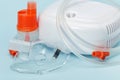 Respiratory mask and atomizing cup for compressor nebulizer on blue