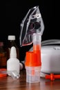 Respiratory mask for compressor nebulizer on table, close up