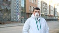 Respiratory Mask Man Empty City Street Amsterdam. People Portrait Look Camera. Royalty Free Stock Photo
