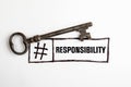 Responsibility Concept. Door key and text on a white background Royalty Free Stock Photo