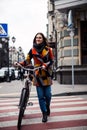 Responsible citizen crossing the street in correct place stock photo