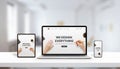 Responsive agency web page on laptop, tablet and phone display concept. Modern, flat web page design Royalty Free Stock Photo