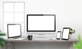 Responsive devices on desk with screen for mockup