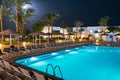 Rest area at an expensive resort. Swimming pool at night in one of the hotels near beach. Beautiful view of the luxurious hotel Royalty Free Stock Photo