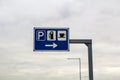 Rest area sign on a pole on freeway road. Royalty Free Stock Photo