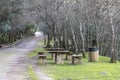 Rest area on the way, hiking route, stone and wooden tables and benches, in the French Bridge area, MonfragÃÂ¼e, CÃÂ¡ceres,