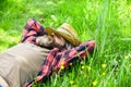 Rest in countryside. Farmer bearded man rest after day work. Farmer relax on green grass. Ecology concept. Summer