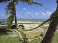 Hammock Rest in hammock. Kitesurf in Caribbean sea. Royalty Free Stock Photo