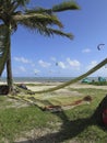 Hammock Rest in hammock. Kitesurf in Caribbean sea. Royalty Free Stock Photo