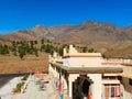 A rest stop in the Atlas Mountains under s blue sky in Morocco Royalty Free Stock Photo