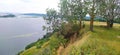 rest in the summer in the shade of trees on a mountain near the wide river Dnepr in the Kyiv region in Ukraine. Royalty Free Stock Photo