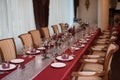 Restaraunt tables with red tablecloth