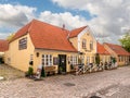 Restaurant along cobbled Teglgade in old town of Mariager, Nordjylland, Denmark